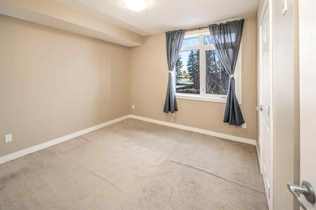 MLS® A2263797 - Unit #103 2419 Centre Street NW in Tuxedo Park Calgary, Residential