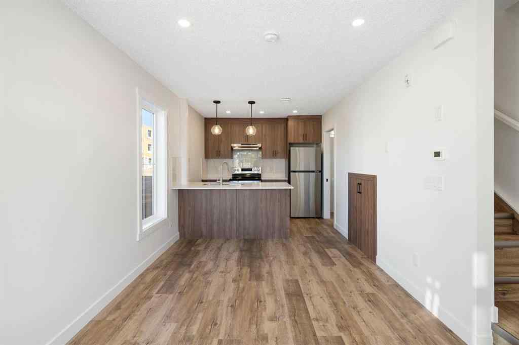 MLS® A2263817 - Unit #101 156 Park Street  in Greystone Cochrane, Residential