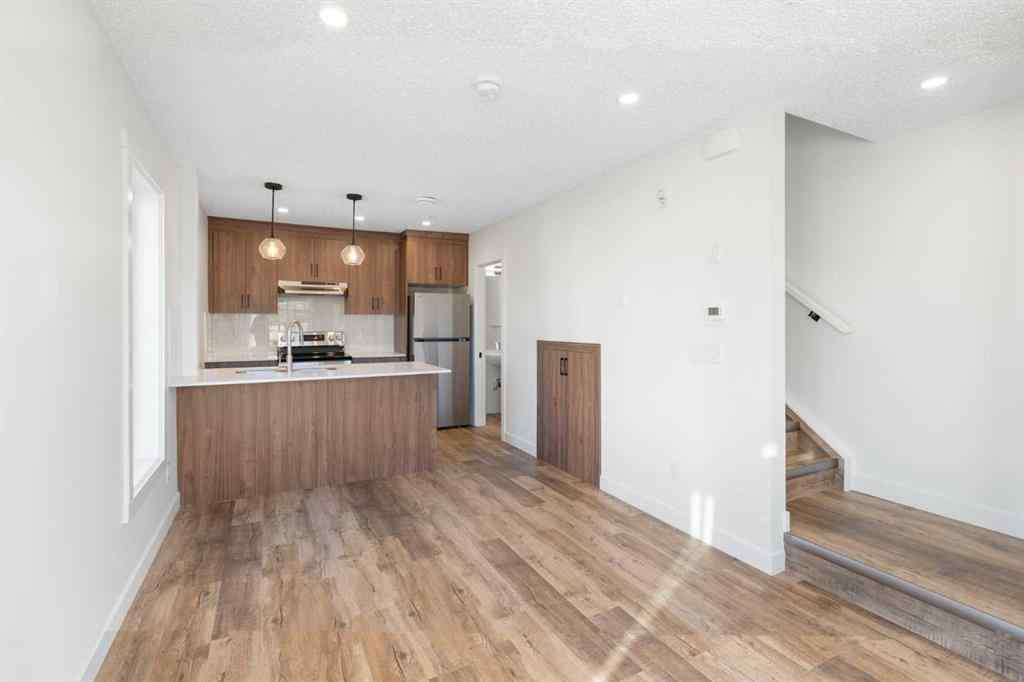 MLS® A2263817 - Unit #101 156 Park Street  in Greystone Cochrane, Residential