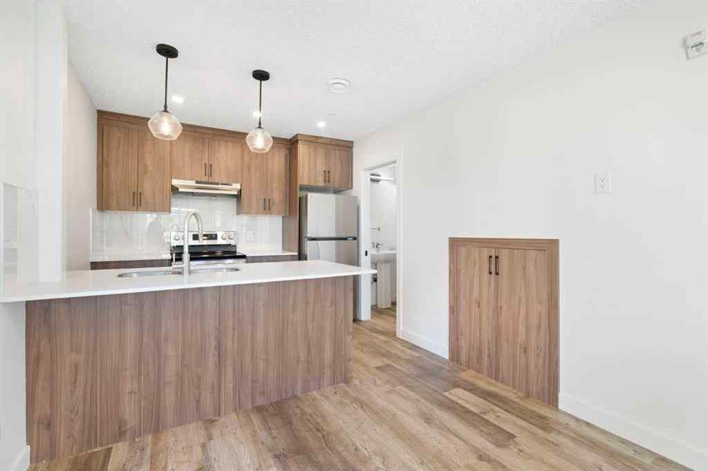 MLS® A2263817 - Unit #101 156 Park Street  in Greystone Cochrane, Residential