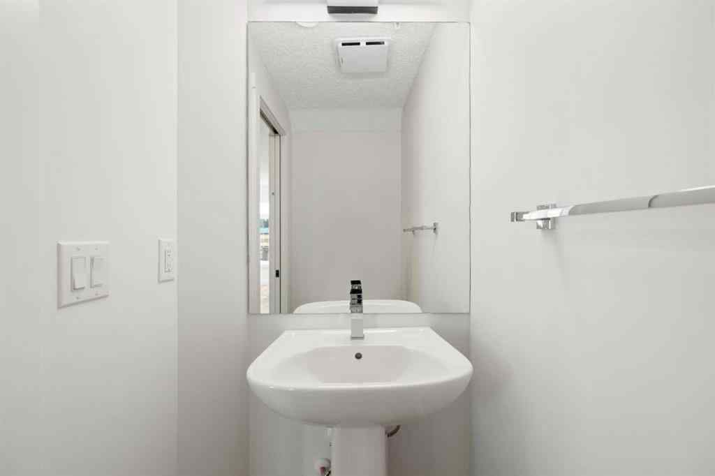 MLS® A2263817 - Unit #101 156 Park Street  in Greystone Cochrane, Residential