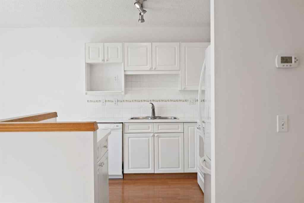 MLS® A2263822 - 185 Mt Douglas Manor SE in McKenzie Lake Calgary, Residential