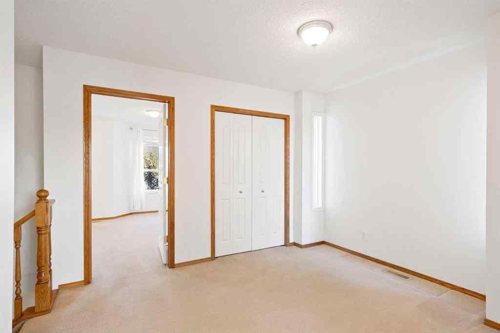 MLS® A2263822 - 185 Mt Douglas Manor SE in McKenzie Lake Calgary, Residential