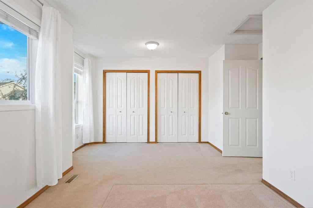 MLS® A2263822 - 185 Mt Douglas Manor SE in McKenzie Lake Calgary, Residential