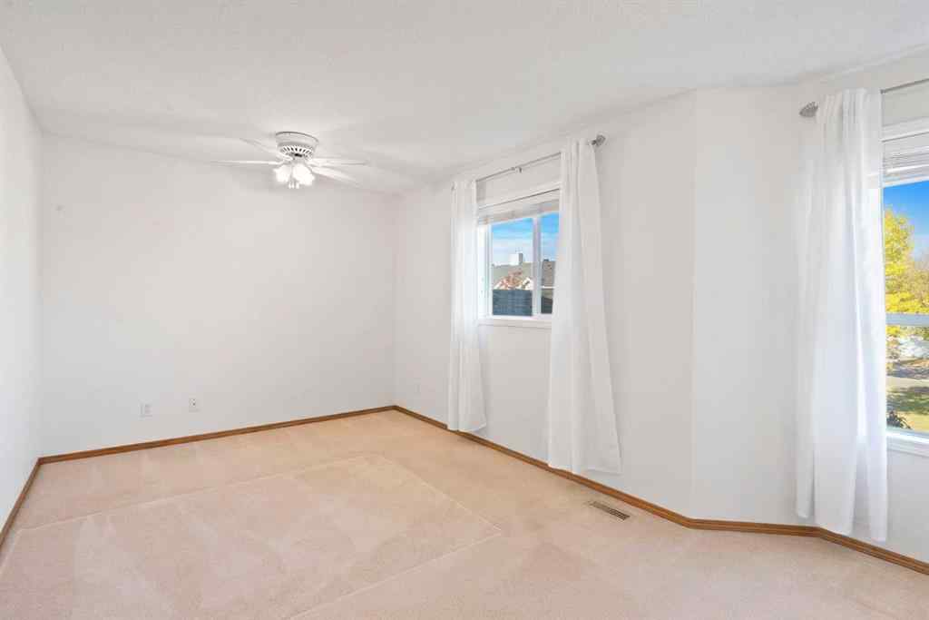 MLS® A2263822 - 185 Mt Douglas Manor SE in McKenzie Lake Calgary, Residential