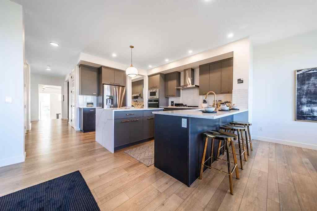 MLS® A2263851 - 301 Dawson Wharf Road  in Dawson\'s Landing Chestermere, Residential