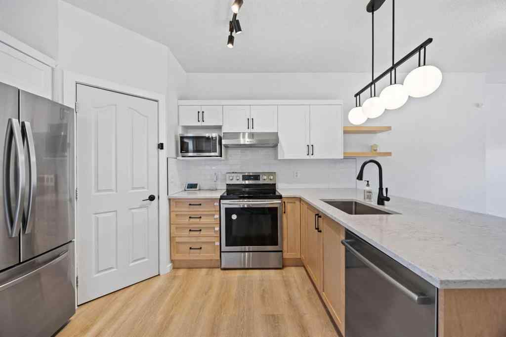 MLS® A2263906 - Unit #201 2066 Luxstone Boulevard SW in Luxstone Airdrie, Residential