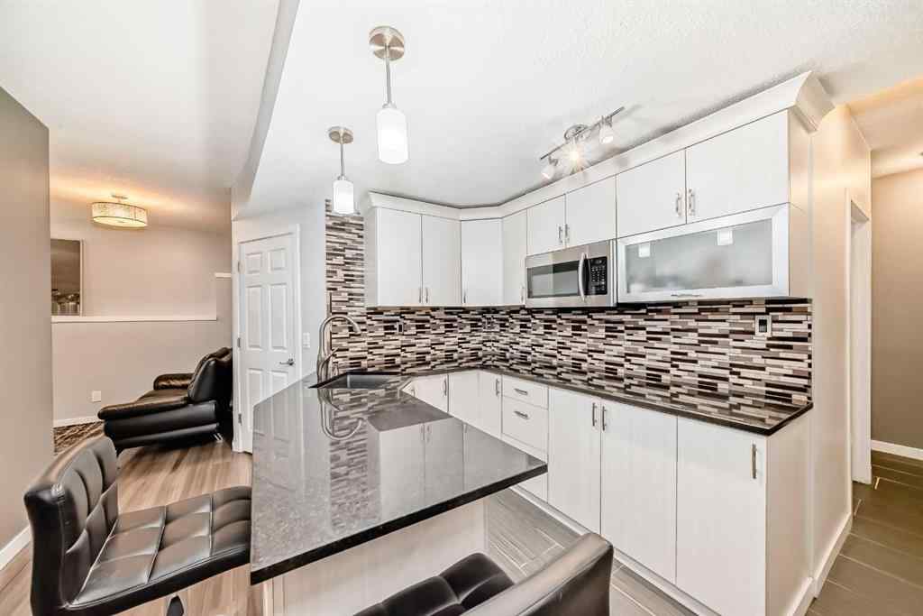 MLS® A2263915 - 165 Hillcrest Drive SW in Hillcrest Airdrie, Residential