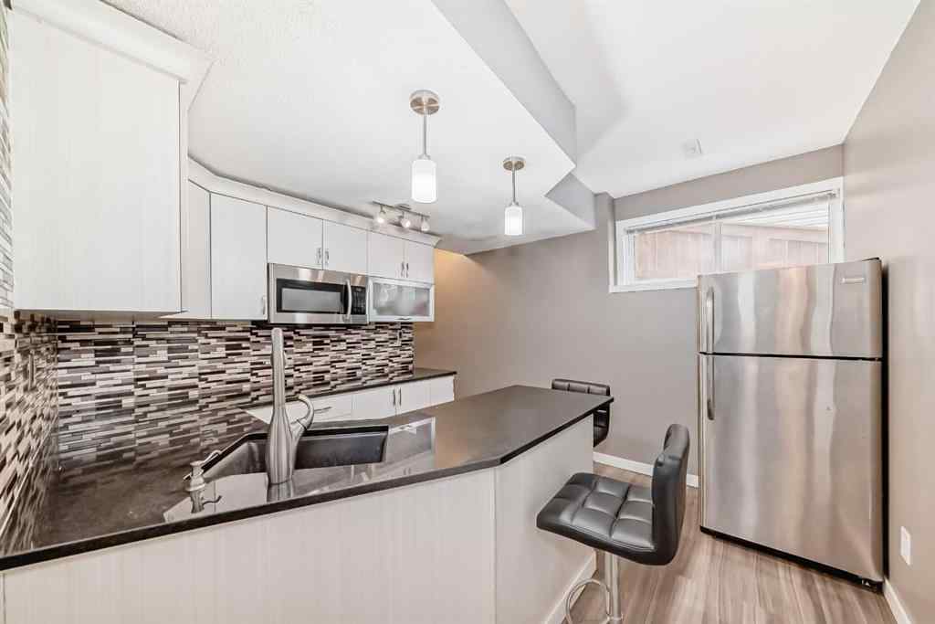 MLS® A2263915 - 165 Hillcrest Drive SW in Hillcrest Airdrie, Residential