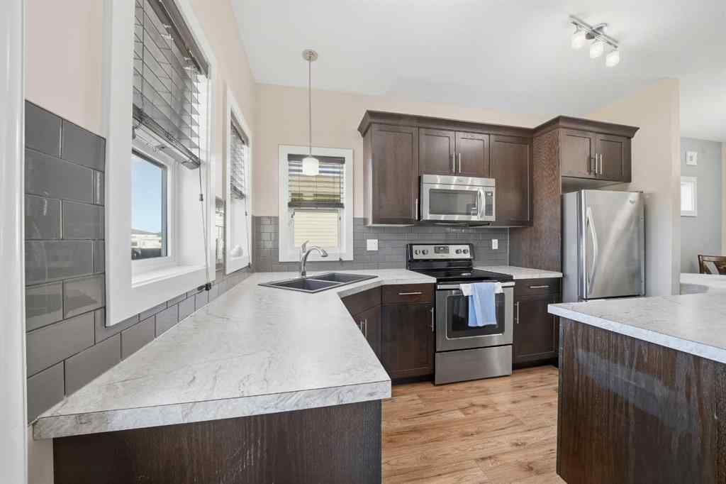 MLS® A2263916 - 22 Mackenzie Ranch Way  in MacKenzie Ranch Lacombe, Residential