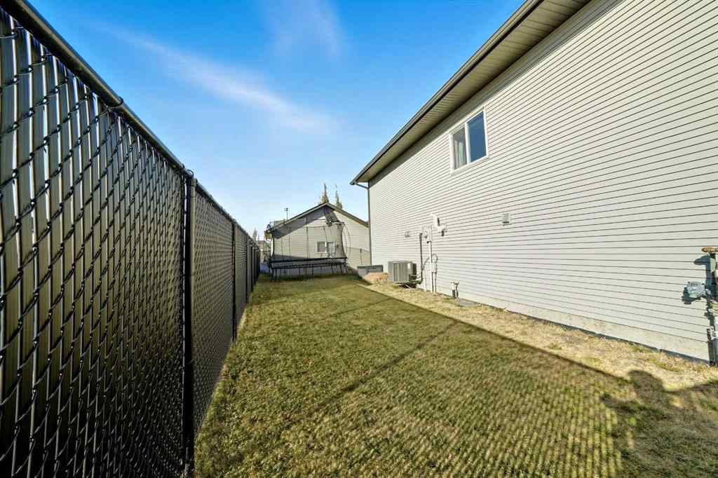MLS® A2263916 - 22 Mackenzie Ranch Way  in MacKenzie Ranch Lacombe, Residential