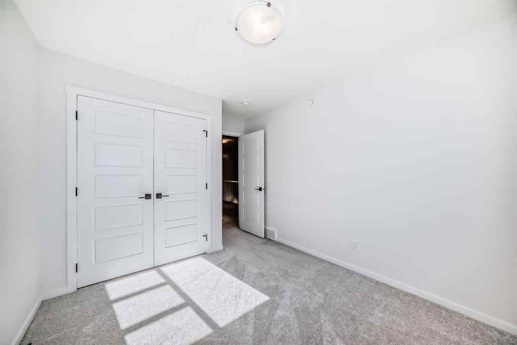 MLS® A2263924 - 215 148 Avenue NW in Livingston Calgary, Residential