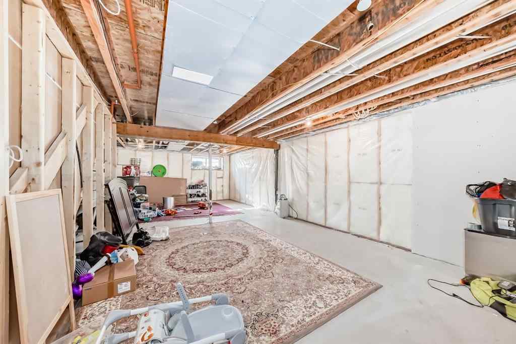 MLS® A2263924 - 215 148 Avenue NW in Livingston Calgary, Residential