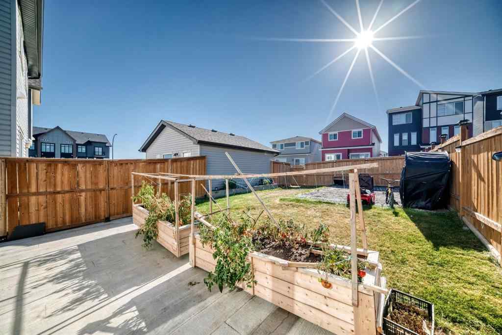 MLS® A2263924 - 215 148 Avenue NW in Livingston Calgary, Residential