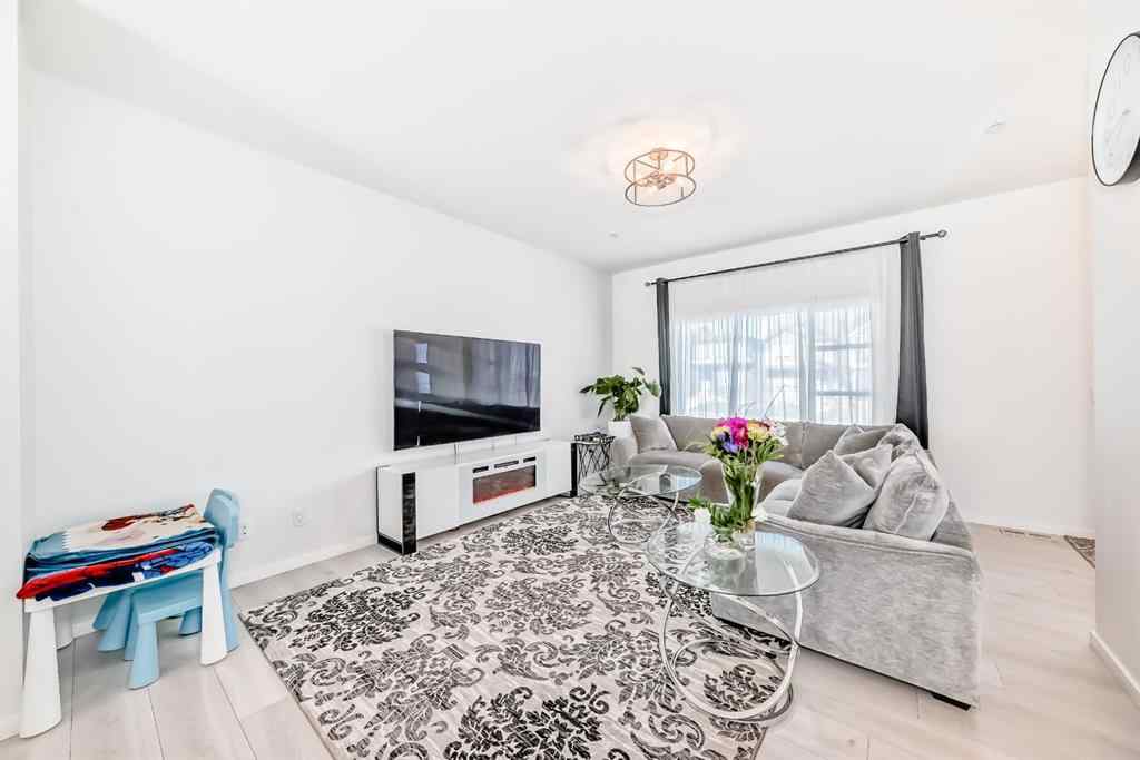 MLS® A2263924 - 215 148 Avenue NW in Livingston Calgary, Residential