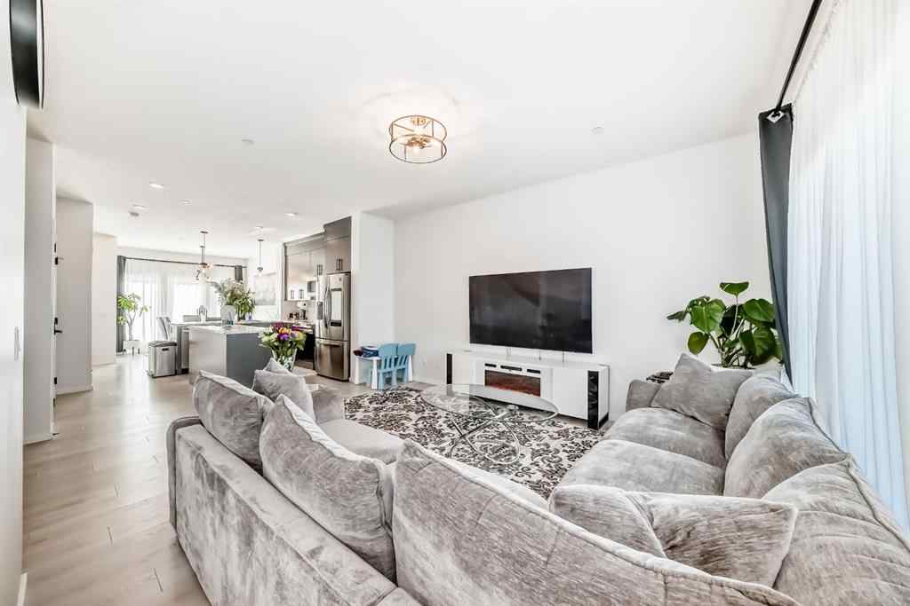 MLS® A2263924 - 215 148 Avenue NW in Livingston Calgary, Residential