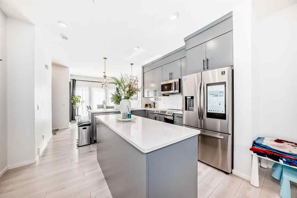 MLS® A2263924 - 215 148 Avenue NW in Livingston Calgary, Residential