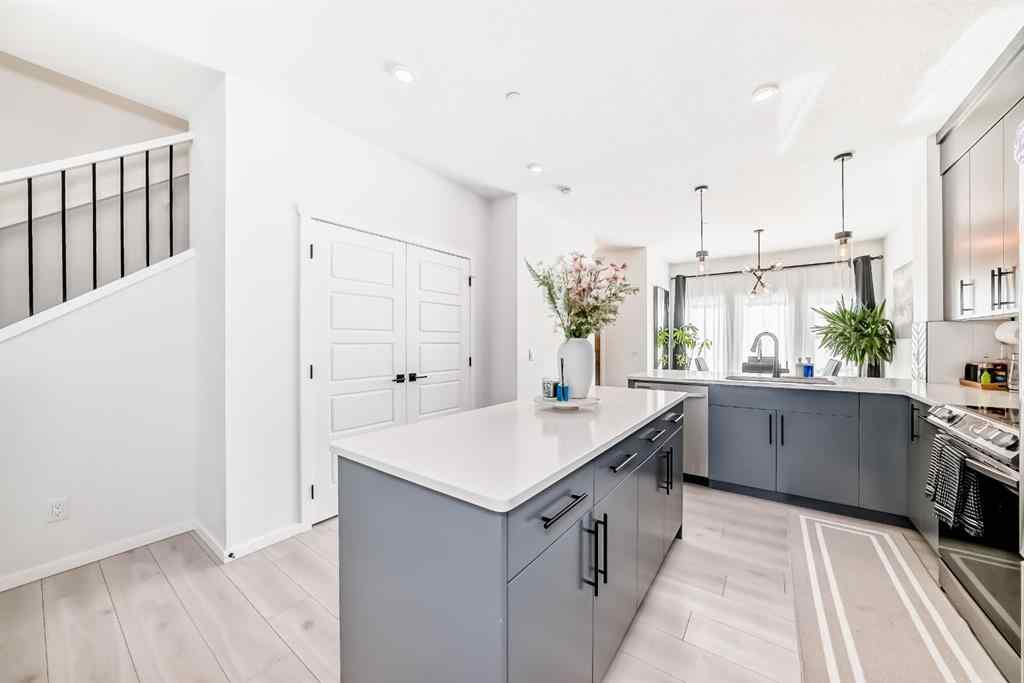 MLS® A2263924 - 215 148 Avenue NW in Livingston Calgary, Residential