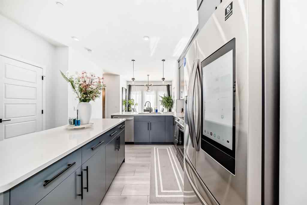 MLS® A2263924 - 215 148 Avenue NW in Livingston Calgary, Residential