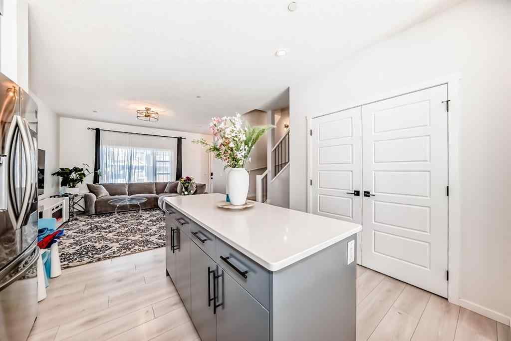 MLS® A2263924 - 215 148 Avenue NW in Livingston Calgary, Residential