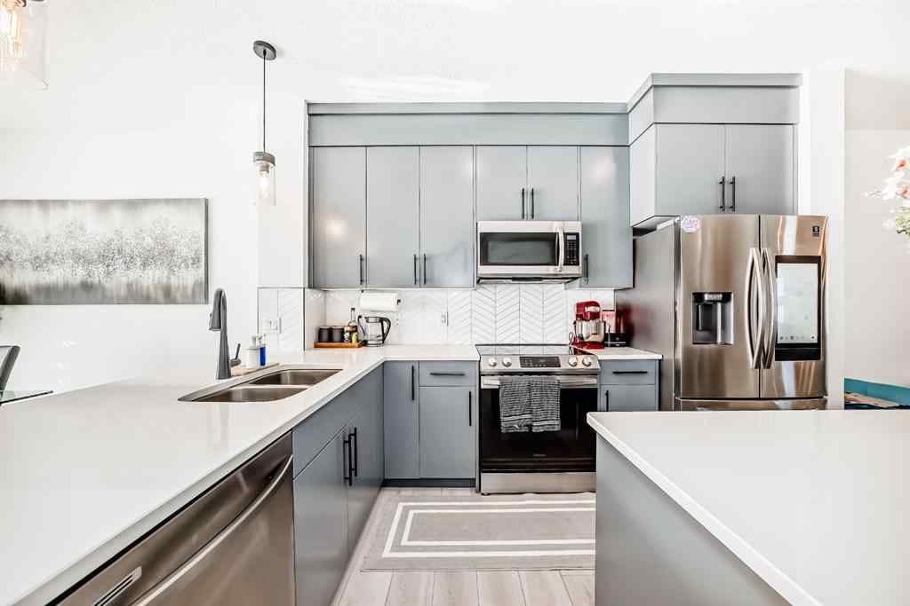 MLS® A2263924 - 215 148 Avenue NW in Livingston Calgary, Residential