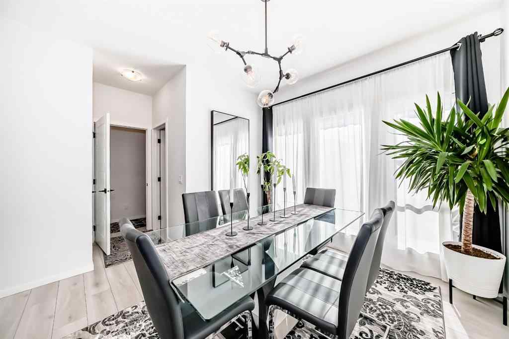 MLS® A2263924 - 215 148 Avenue NW in Livingston Calgary, Residential