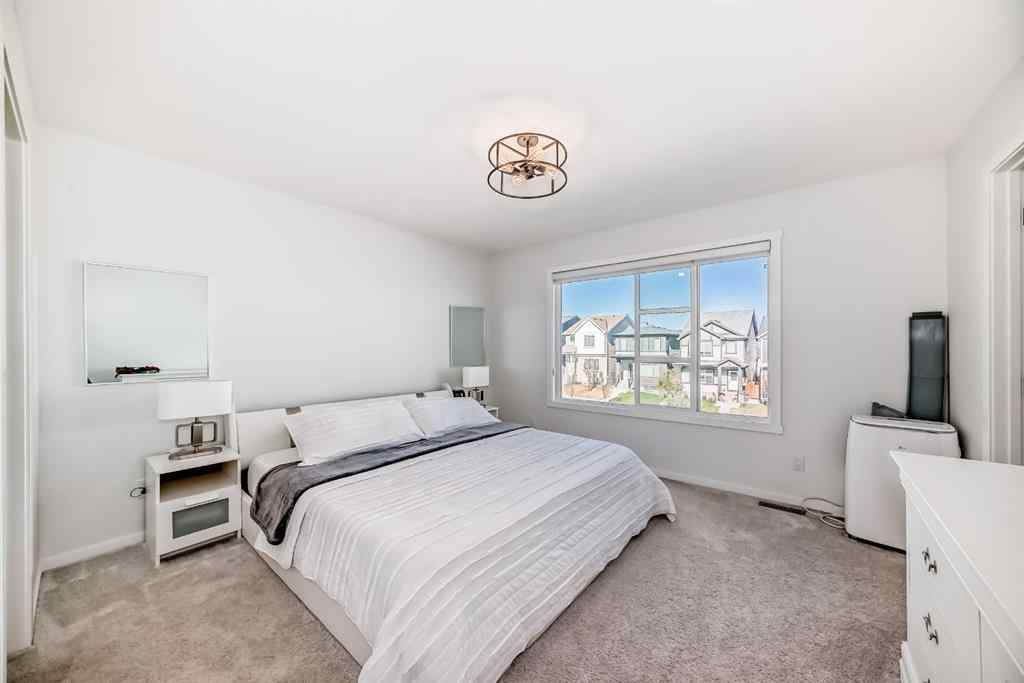 MLS® A2263924 - 215 148 Avenue NW in Livingston Calgary, Residential