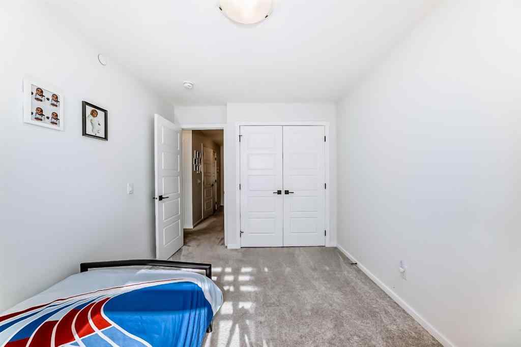 MLS® A2263924 - 215 148 Avenue NW in Livingston Calgary, Residential