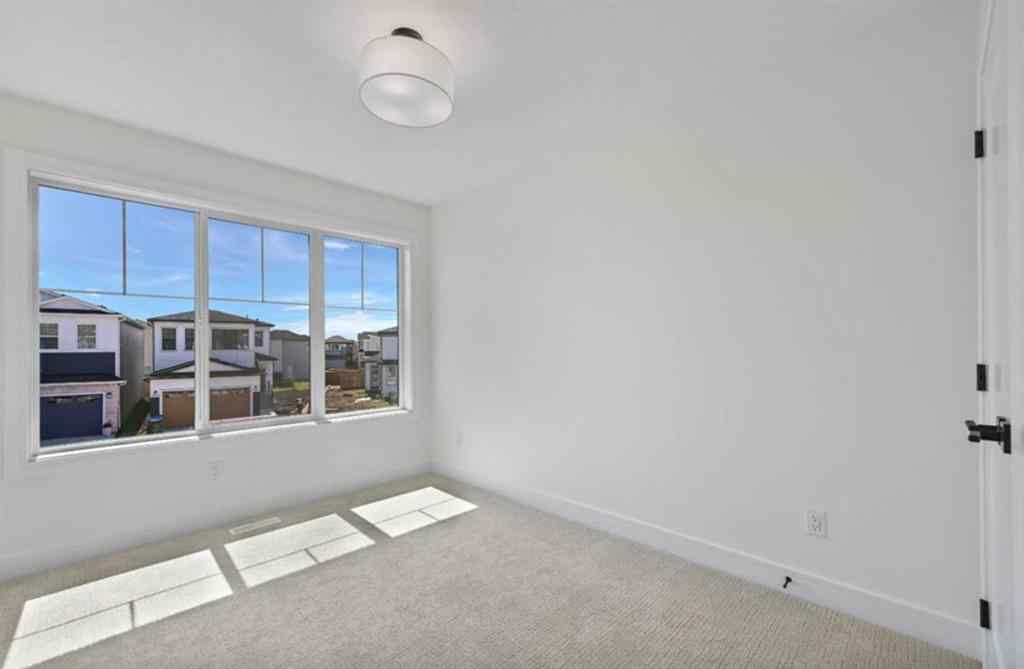 MLS® A2263953 - 57 Walgrove Bay SE in Walden Calgary, Residential