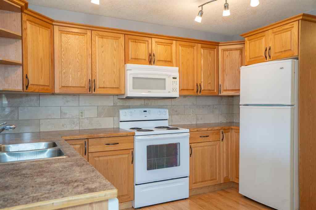 MLS® A2263968 - 4521 Van Eaton Way   in NONE Clive, Residential