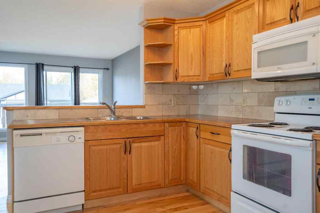 MLS® A2263968 - 4521 Van Eaton Way   in NONE Clive, Residential