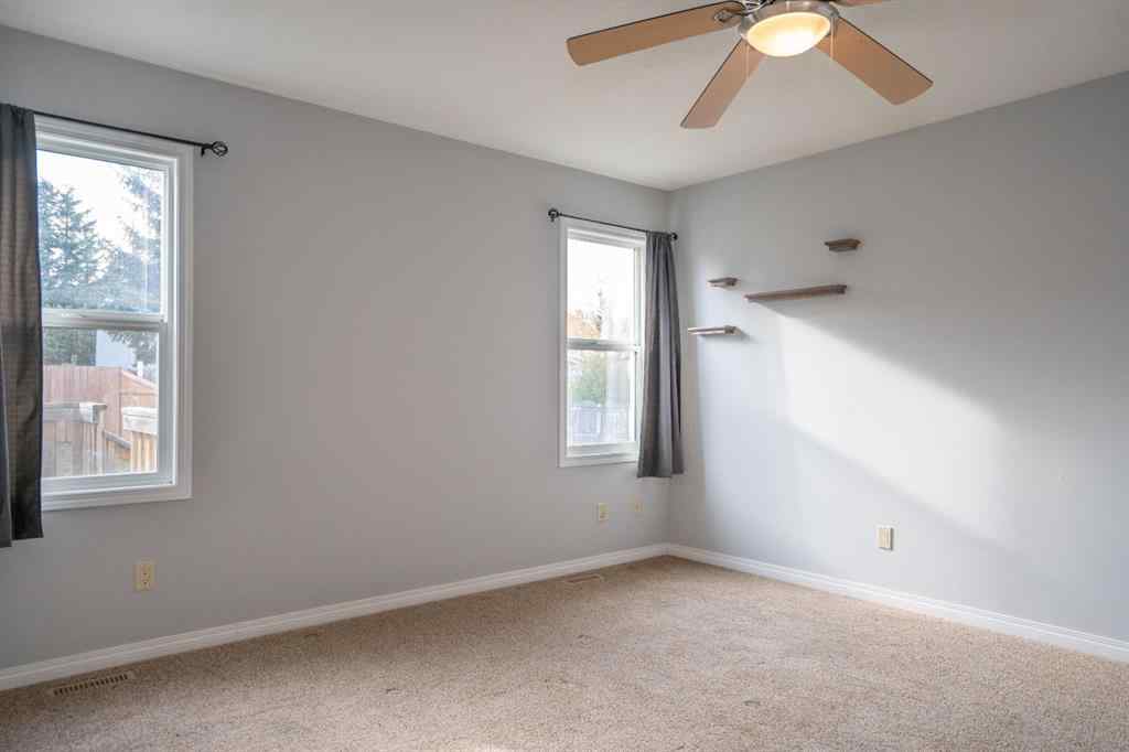 MLS® A2263968 - 4521 Van Eaton Way   in NONE Clive, Residential