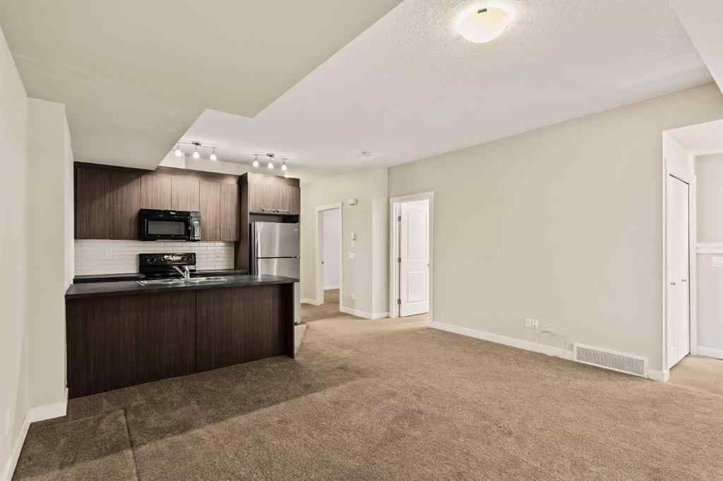 MLS® A2263973 - Unit #212 300 Marina Drive  in Westmere Chestermere, Residential