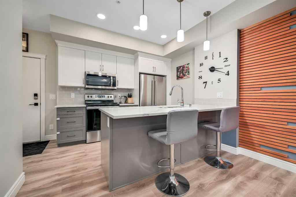 MLS® A2263978 - Unit #102 19661 40 Street SE in Seton Calgary, Residential