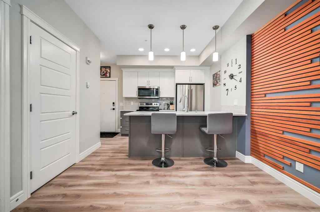 MLS® A2263978 - Unit #102 19661 40 Street SE in Seton Calgary, Residential