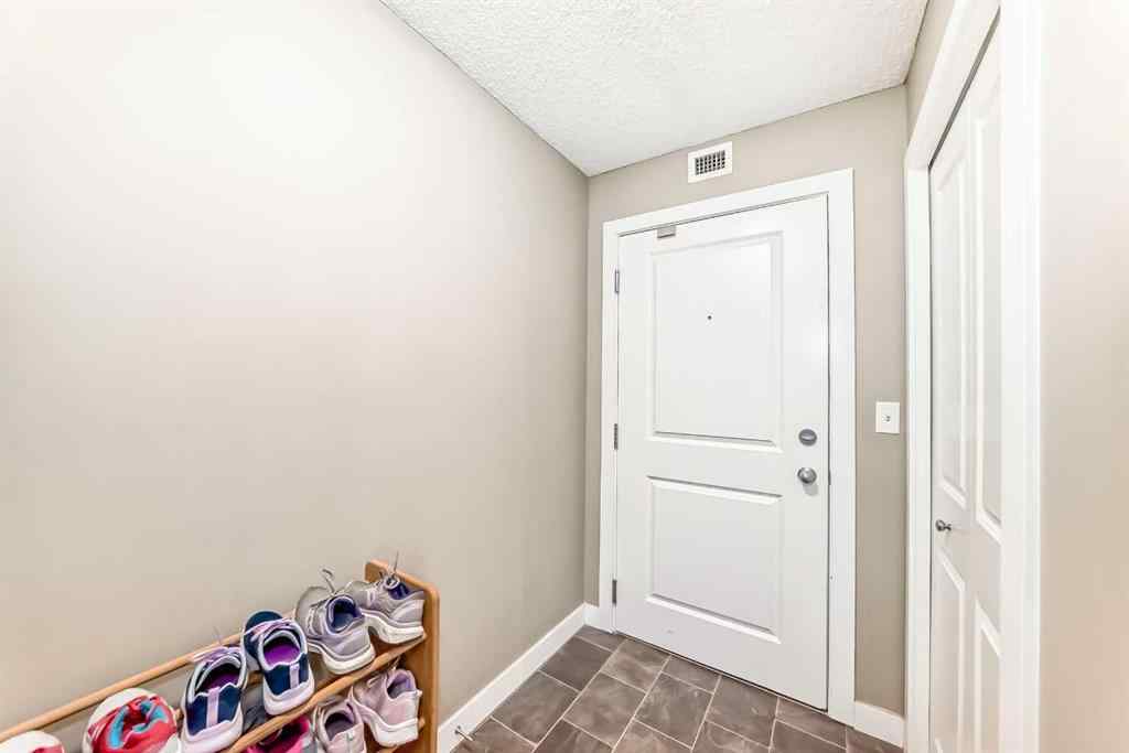 MLS® A2263997 - Unit #8201 403 Mackenzie Way SW in Downtown Airdrie, Residential