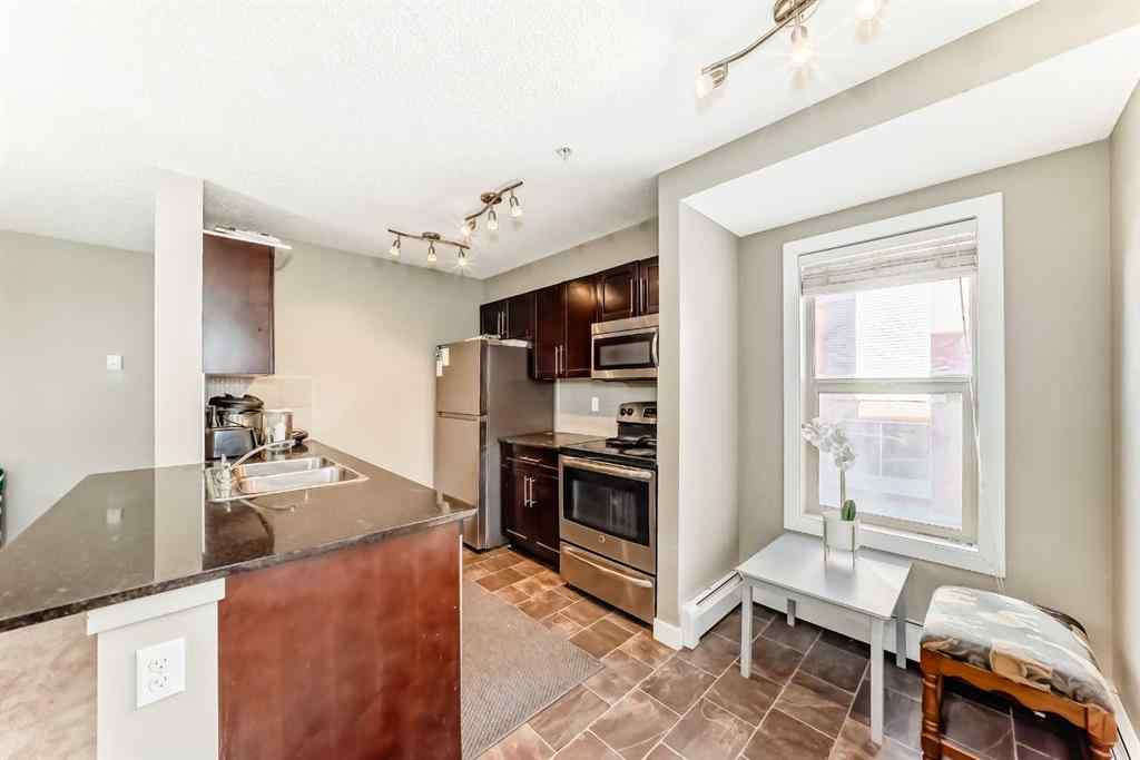 MLS® A2263997 - Unit #8201 403 Mackenzie Way SW in Downtown Airdrie, Residential