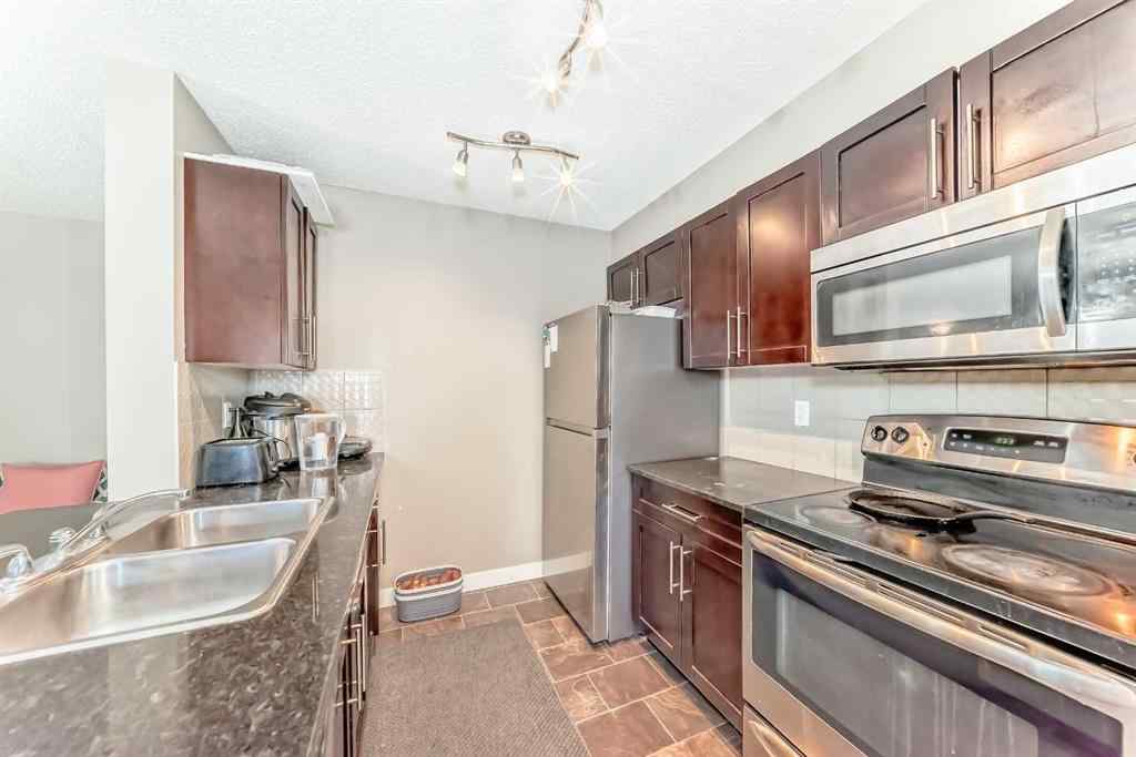 MLS® A2263997 - Unit #8201 403 Mackenzie Way SW in Downtown Airdrie, Residential