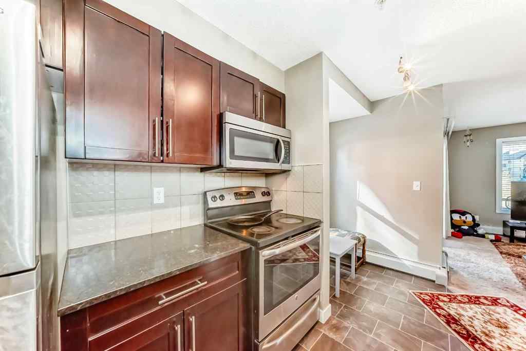 MLS® A2263997 - Unit #8201 403 Mackenzie Way SW in Downtown Airdrie, Residential