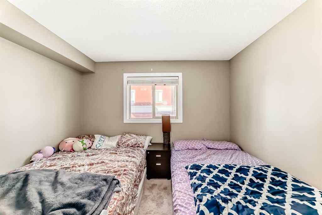 MLS® A2263997 - Unit #8201 403 Mackenzie Way SW in Downtown Airdrie, Residential