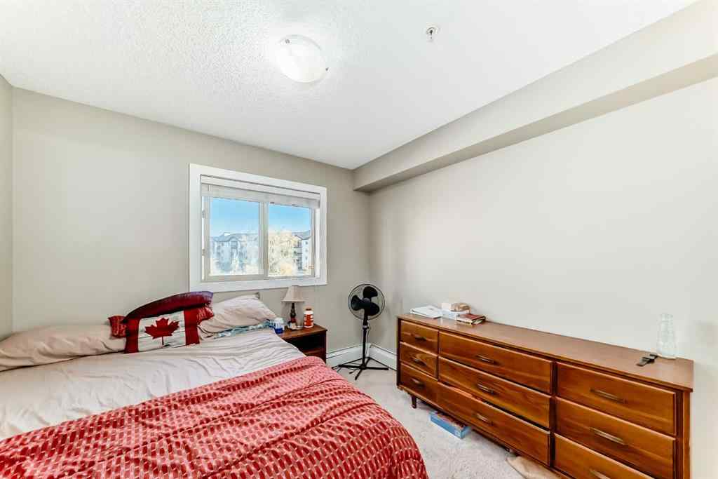 MLS® A2263997 - Unit #8201 403 Mackenzie Way SW in Downtown Airdrie, Residential