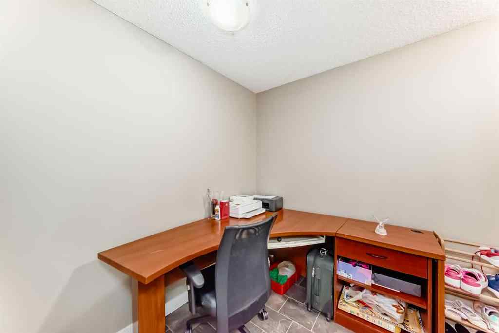 MLS® A2263997 - Unit #8201 403 Mackenzie Way SW in Downtown Airdrie, Residential