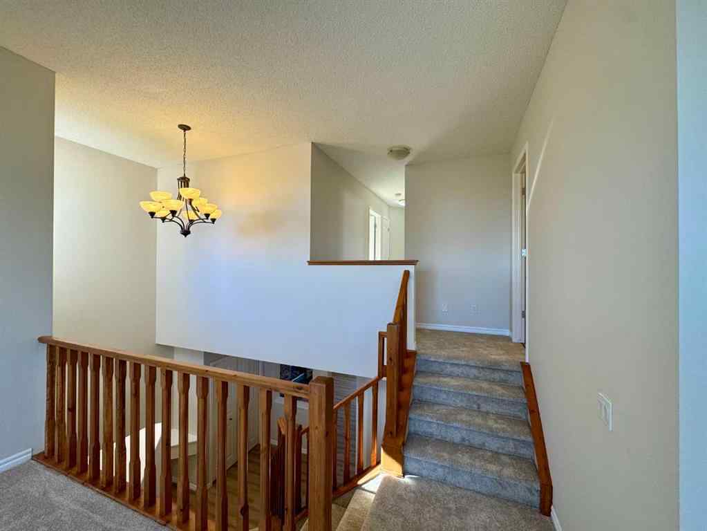 MLS® A2264005 - 70 Glensummit Close  in GlenEagles Cochrane, Residential