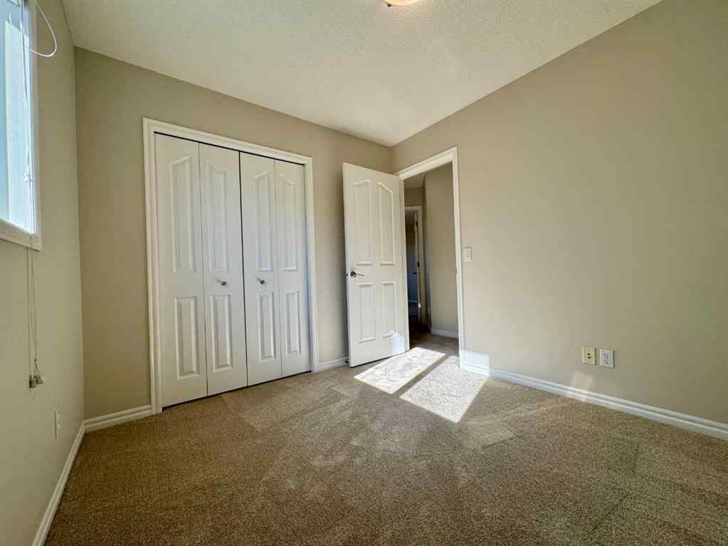 MLS® A2264005 - 70 Glensummit Close  in GlenEagles Cochrane, Residential