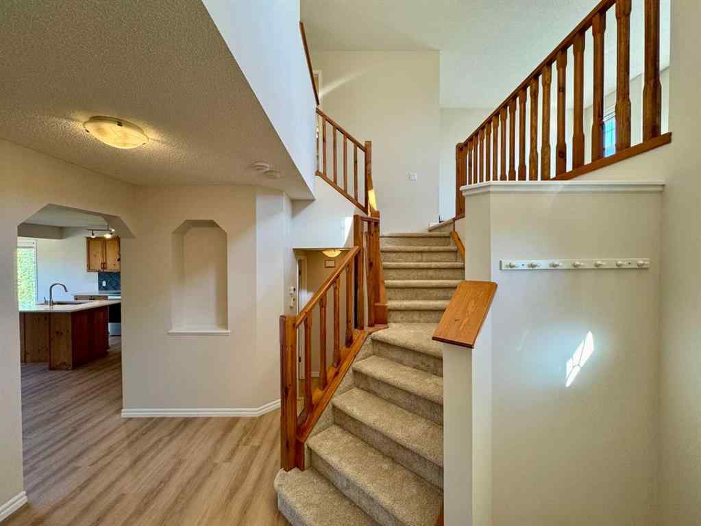 MLS® A2264005 - 70 Glensummit Close  in GlenEagles Cochrane, Residential