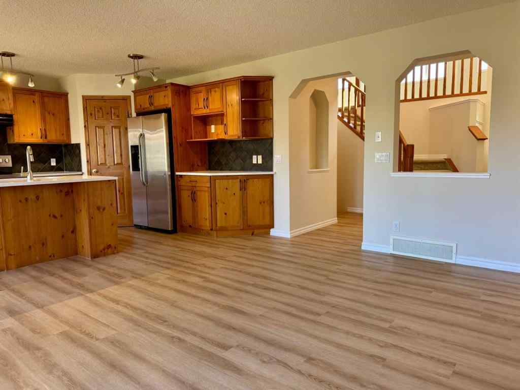 MLS® A2264005 - 70 Glensummit Close  in GlenEagles Cochrane, Residential