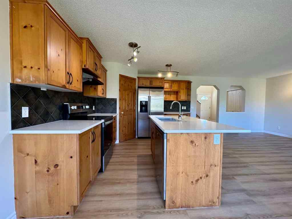 MLS® A2264005 - 70 Glensummit Close  in GlenEagles Cochrane, Residential