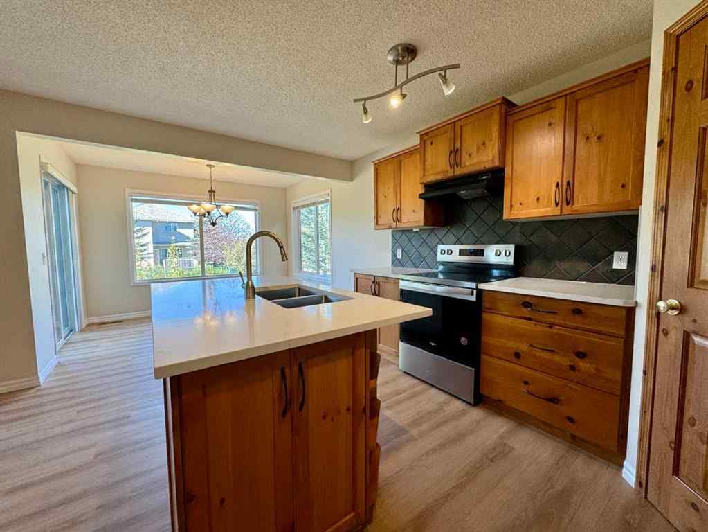MLS® A2264005 - 70 Glensummit Close  in GlenEagles Cochrane, Residential