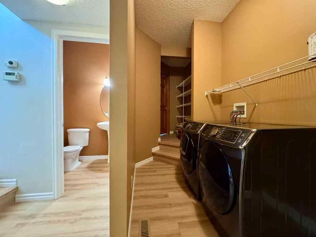 MLS® A2264005 - 70 Glensummit Close  in GlenEagles Cochrane, Residential
