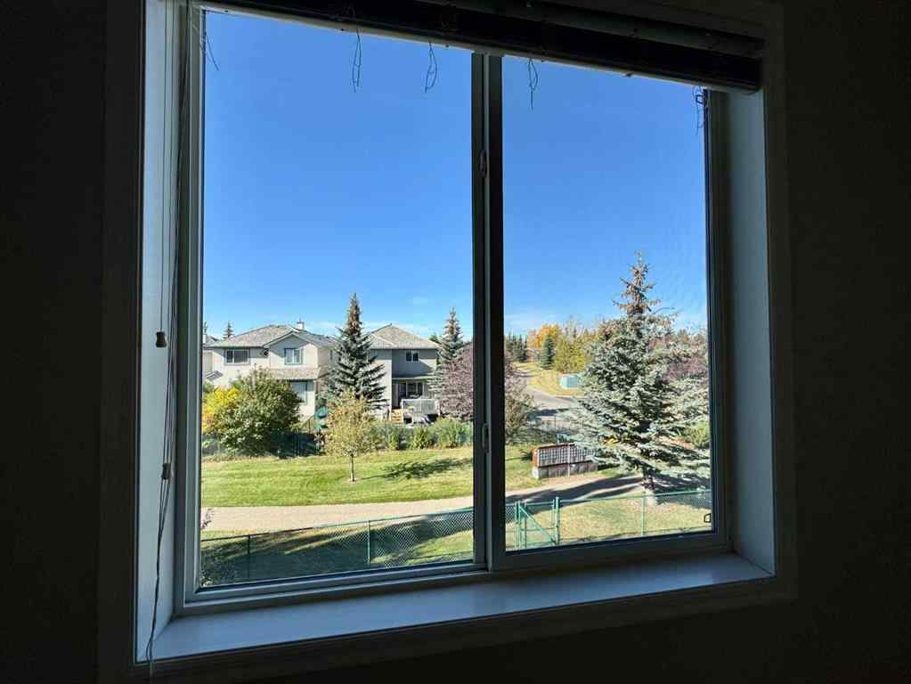 MLS® A2264005 - 70 Glensummit Close  in GlenEagles Cochrane, Residential